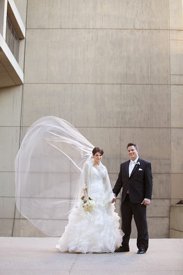 bride and groom pose together - wedding photo by top Philadelphia based wedding photographers Langdon Photography